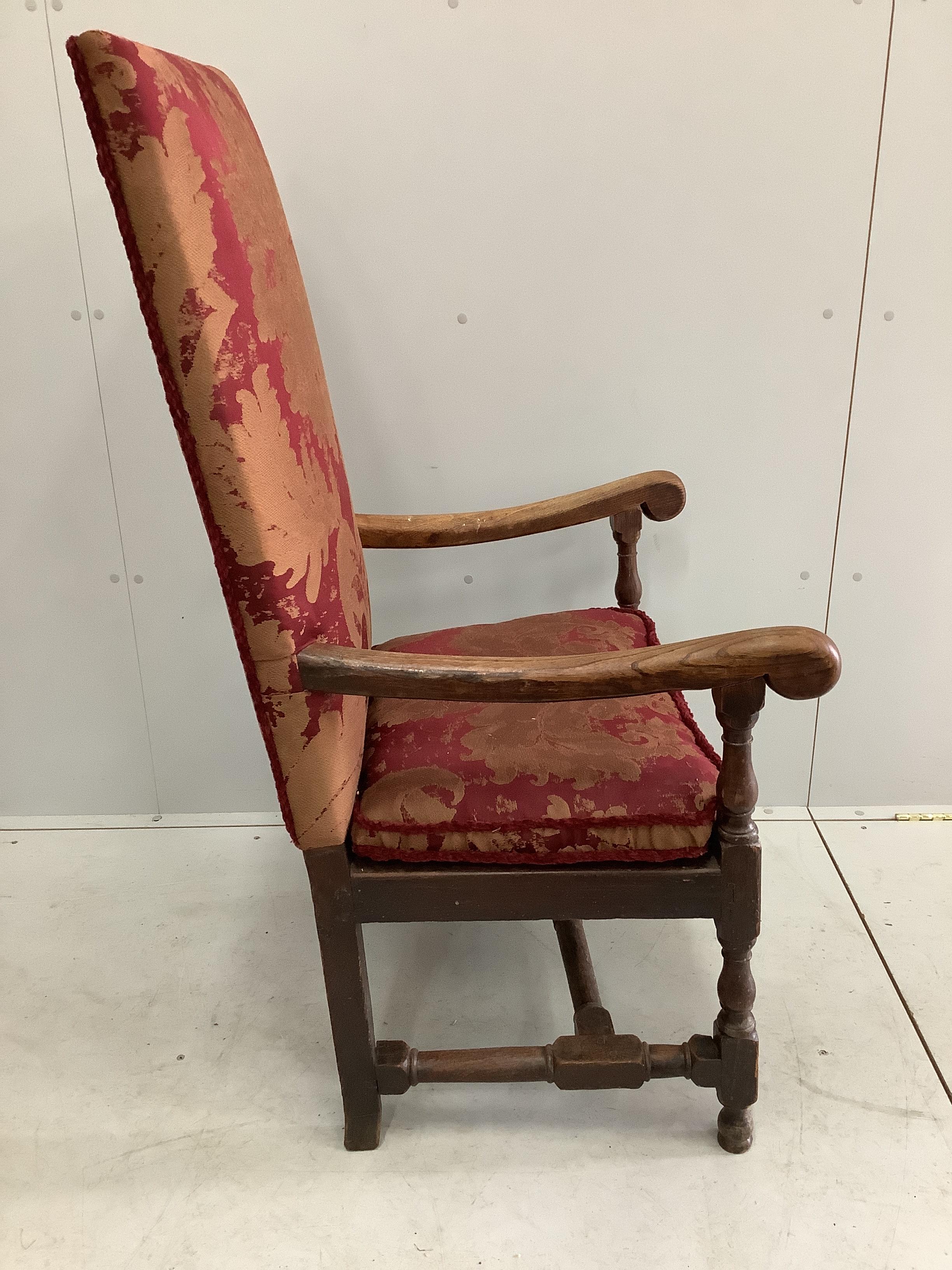 An 18th century style upholstered oak armchair, width 68cm, depth 51cm, height 125cm